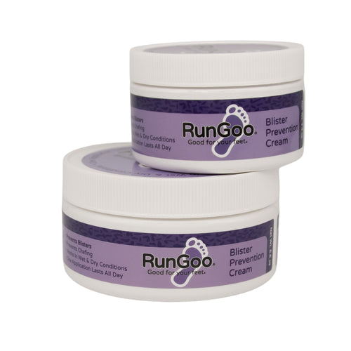 Two jars of RunGoo Blister Prevention Cream on a white background